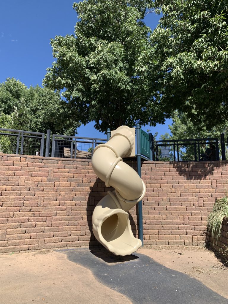 A thrilling slide in a park that excites kids and adds an element of adventure to their travel experience. 
 Adding excitement to things to do in Golden with kids.