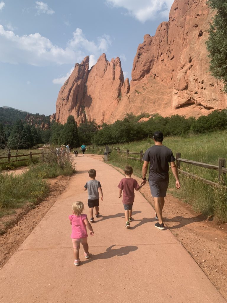 Family hiking in Colorado Springs with kids at Garden of the Gods.