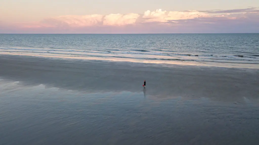 A boy on a beach  on a Hilton Head family vacation.